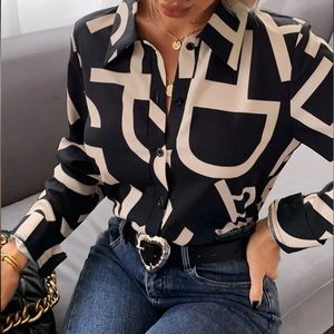 New without tags button up top. Never been worn. In like new condition.